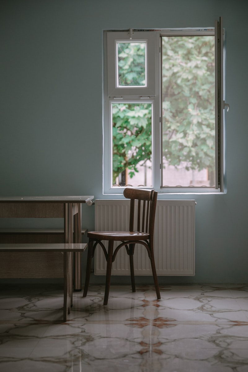 empty chair near window